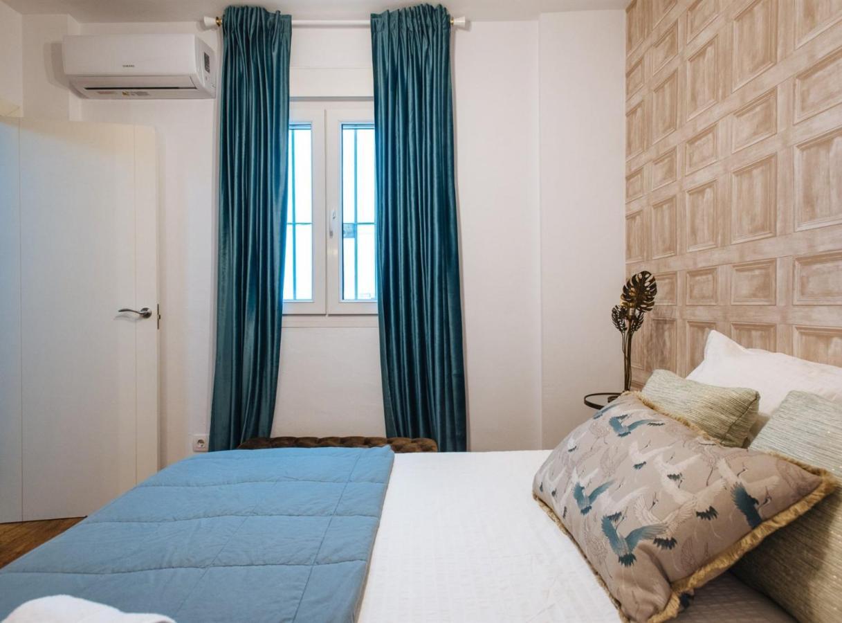 Feijoo Suite Apartment Sevilla Bagian luar foto